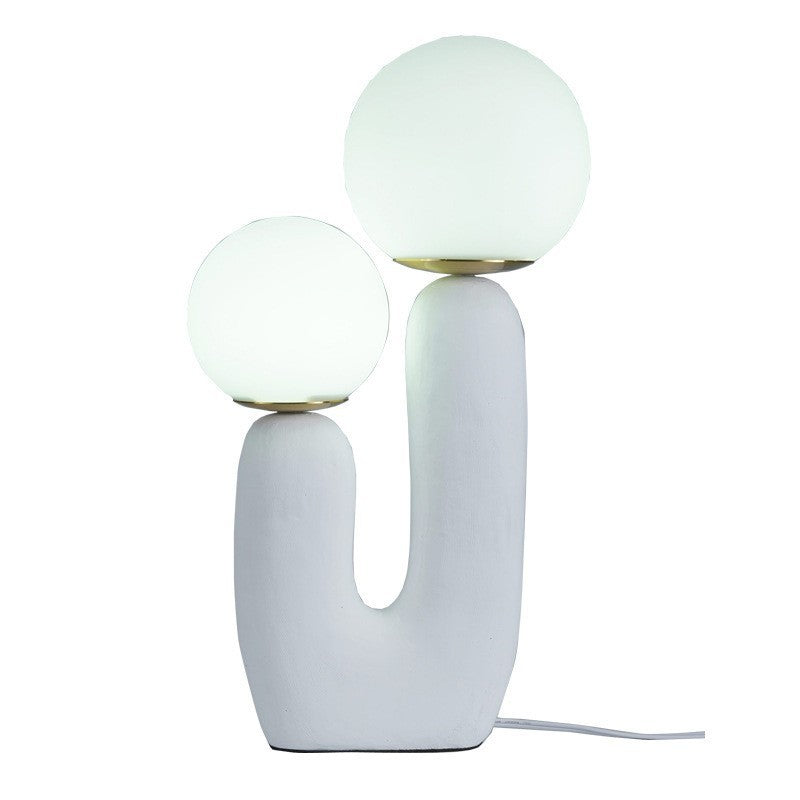 Two-arm decorative table lamp