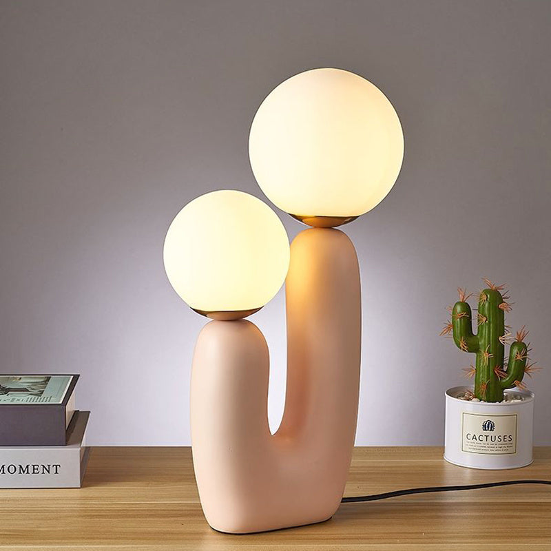 Two-arm decorative table lamp